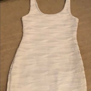 White shape-fitting dress